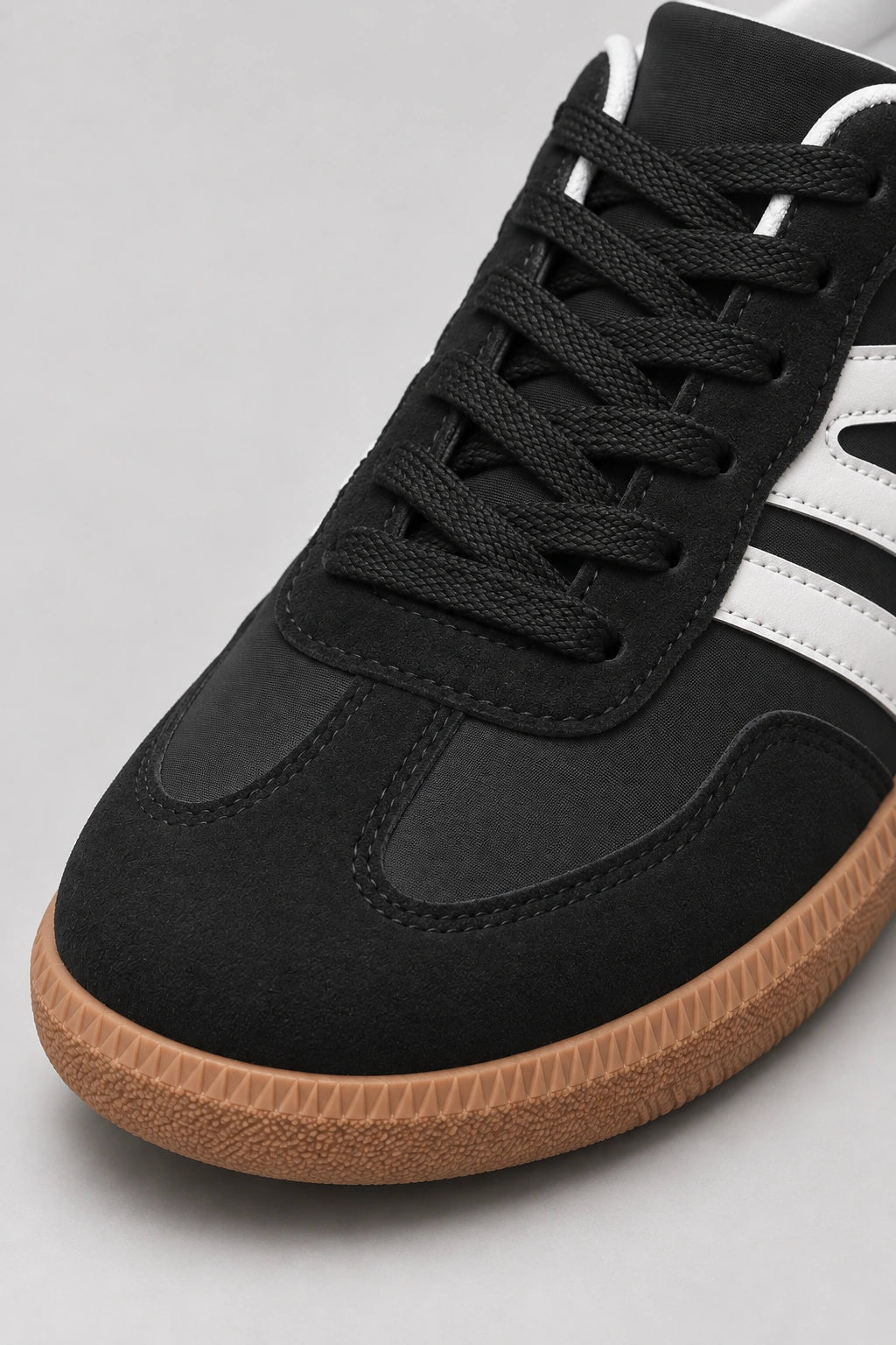 Mila Walking Sneakers in Black – toe laces detail