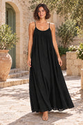 Sienna Open Back Maxi Dress in Black – courtyard lifestyle view