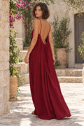 Sienna Open Back Maxi Dress in Burgundy – courtyard lifestyle view