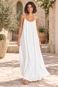 Sienna Open Back Maxi Dress in White – courtyard lifestyle view